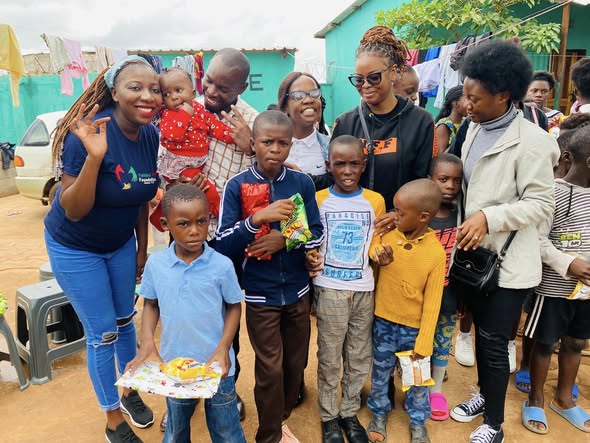 FHF volunteers and children during the December 2022 Christmas outreach