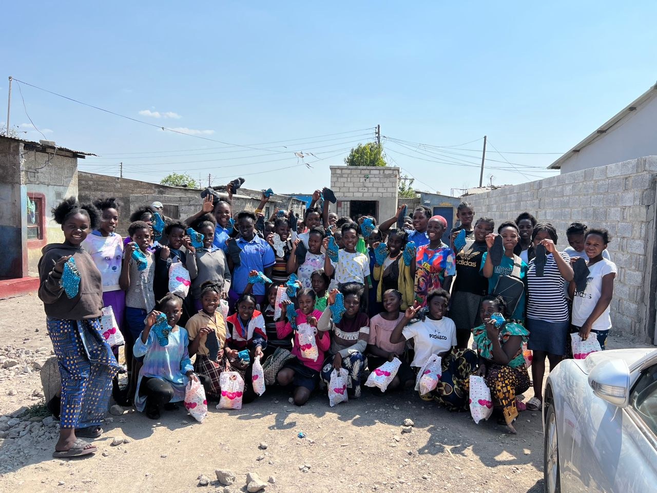 ReusablePads4Girls participants holding completed kits